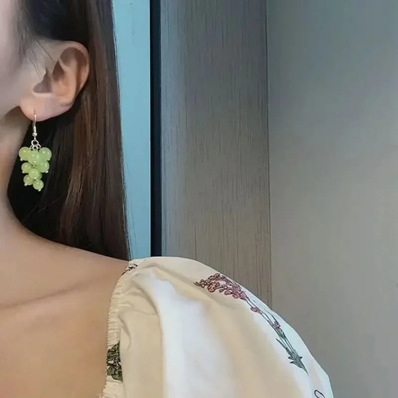 BRINCOS DE UVA VERDE: ELEGÂNCIA E ESTILO EM CADA DETALHE